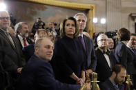 <p>House Majority Whip Steve Scalise, R-La., foreground, House Minority Leader Nancy Pelosi, D-Calif., center and House Majority Leader Kevin McCarthy, R-Calif., right and waits for the ceremony to begin honoring Reverend Billy Graham in the Rotunda of the U.S. Capitol building, Wednesday, Feb. 28, in Washington. (Photo: Evan Vucci/AP) </p>