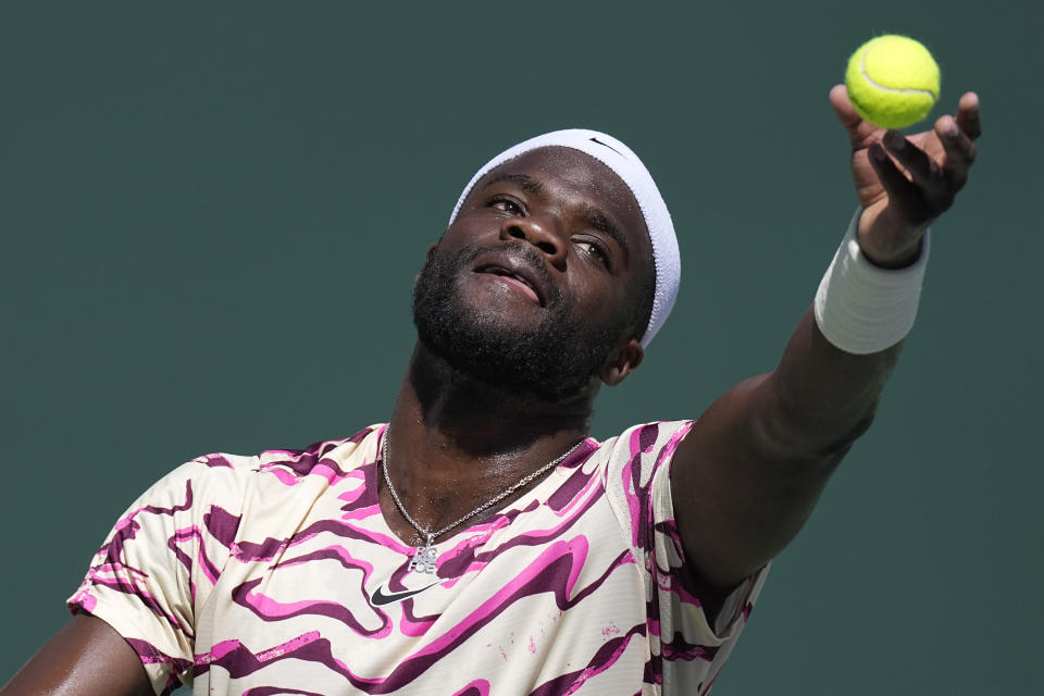 Frances Tiafoe, of the United States, serves to Daniil Medvedev, of Russia, during a semifinal match at the BNP Paribas Open tennis tournament Saturday, March 18, 2023, in Indian Wells, Calif. (AP Photo/Mark J. Terrill)