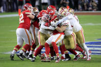 MIAMI, FLORIDA - FEBRUARY 02: Damien Williams #26 of the Kansas City Chiefs is tackled against the San Francisco 49ers during the fourth quarter in Super Bowl LIV at Hard Rock Stadium on February 02, 2020 in Miami, Florida. (Photo by Andy Lyons/Getty Images)