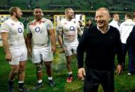 Rugby Union - Rugby Test - England v Australia's Wallabies - Melbourne, Australia - 18/06/16. England head coach Eddie Jones (R) celebrates with players after defeating Australia. REUTERS/Brandon Malone