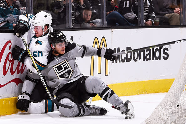 LOS ANGELES, CA - DECEMBER 31: Nic Dowd #26 of the Los Angeles Kings battles for the puck against Chris Tierney #50 of the San Jose Sharks during the game on December 31, 2016 at Staples Center in Los Angeles, California. (Photo by Juan Ocampo/NHLI via Getty Images)