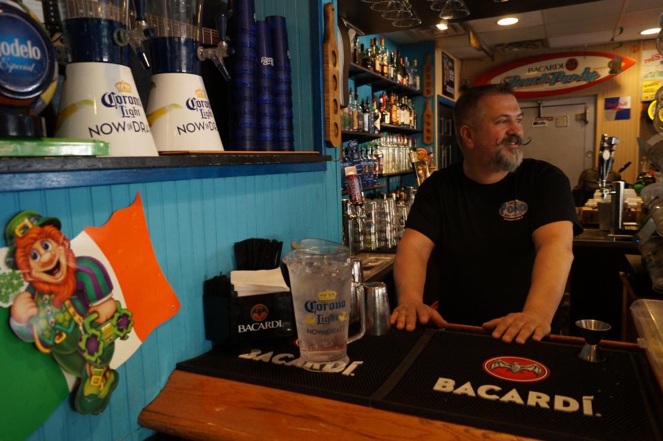 In this undated file photo, Steve Cannon tends bar at the Frogg Pond when it was located in downtown Rehoboth Beach. The restaurant/bar moved to Delaware Route 1 in 2021 and closed for good in September 2023.