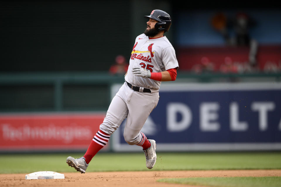 St. Louis Cardinals' Austin Romine runs to second with a double during the fourth inning of a baseball game against the Washington Nationals, Sunday, July 31, 2022, in Washington. (AP Photo/Nick Wass)