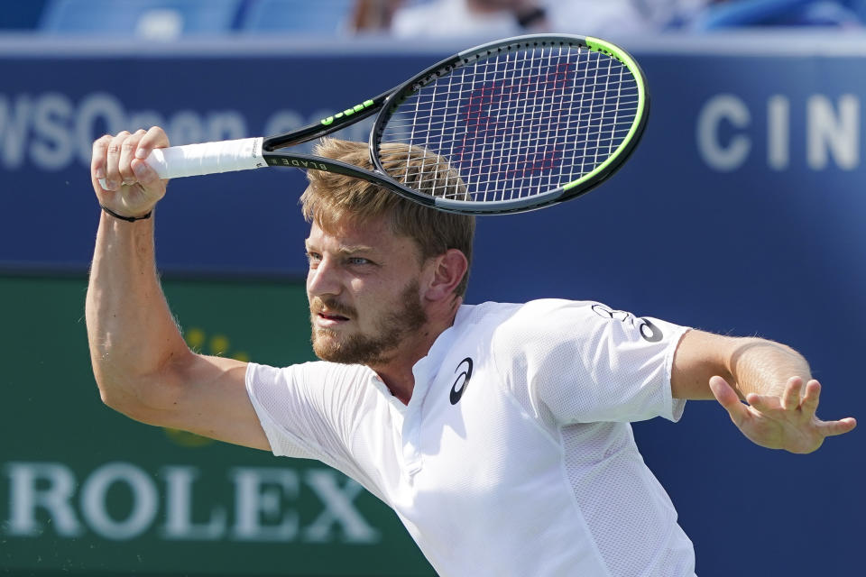 David Goffin, of Belgium, returns to Daniil Medvedev, of Russia, in the men's final match during the Western & Southern Open tennis tournament Sunday, Aug. 18, 2019, in Mason, Ohio. (AP Photo/John Minchillo)