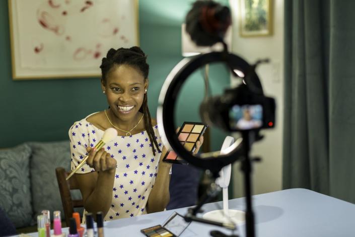 Whether you’re selling workout plans or beauty products, it’s important to regularly interact with your followers. <a href="https://www.gettyimages.com/detail/photo/young-black-woman-filming-a-beauty-and-makeup-vlog-royalty-free-image/1321462216?phrase=social%20media%20influencer&adppopup=true" rel="nofollow noopener" target="_blank" data-ylk="slk:Alistair Berg/DigitalVision via Getty Images" class="link ">Alistair Berg/DigitalVision via Getty Images</a>