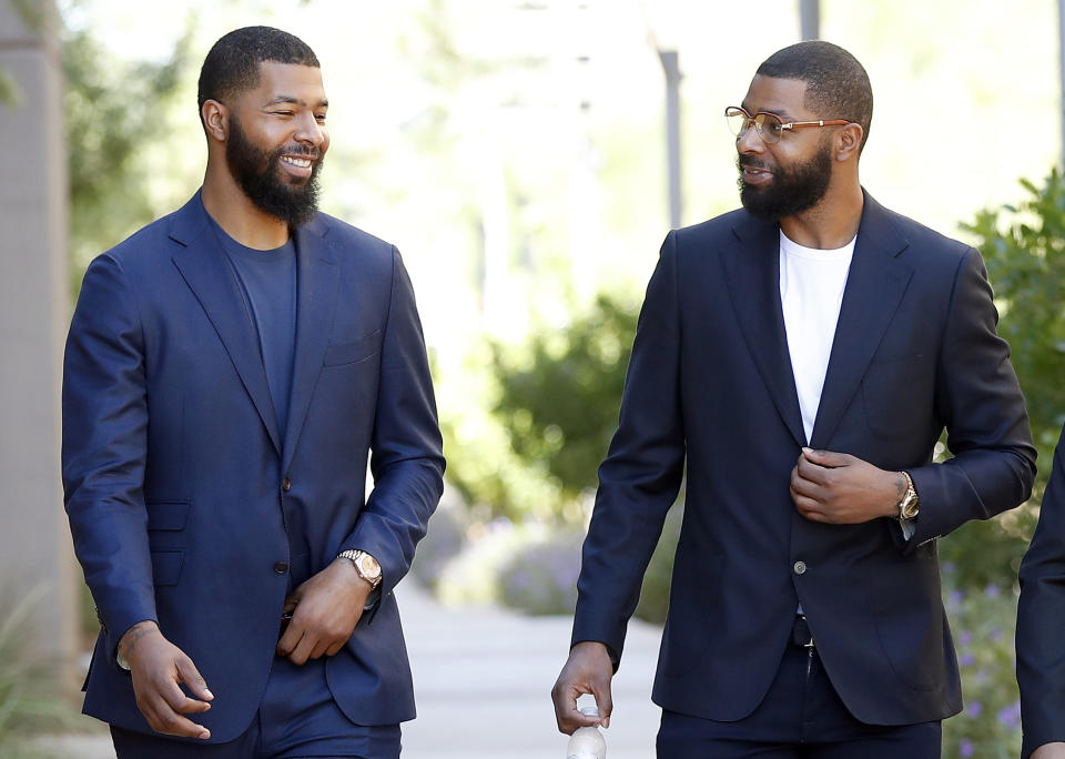 Morris twins Markieff (left) and Marcus were acquitted of the aggravated assault charge against them. (AP)