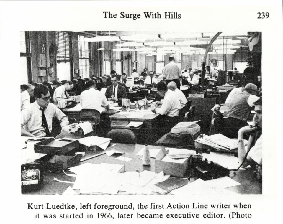 Kurt Luedtke, left foreground, the first Action Line writer when it was started in 1966, later became executive editor.