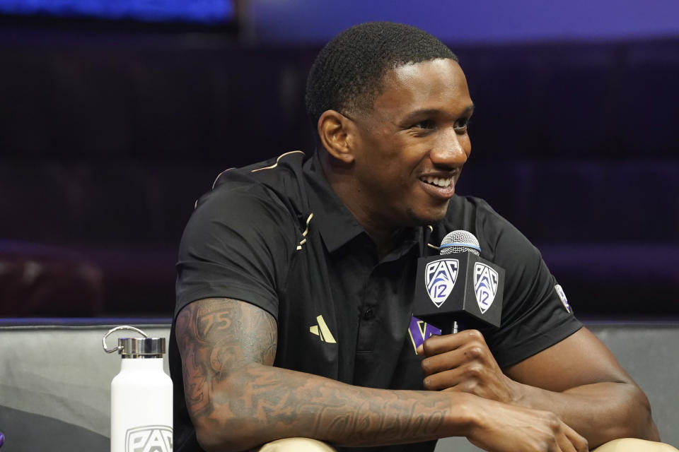 FILE -Washington quarterback Michael Penix Jr. smiles at the Pac-12 NCAA college football media day, Friday, July 21, 2023, in Las Vegas. Washington opens their season at home against Boise State on Sept. 2.(AP Photo/Lucas Peltier, File)