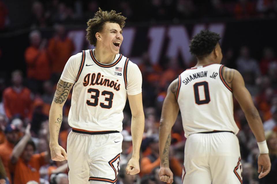 Illinois' Coleman Hawkins (33) reacts after a play during the second half of an NCAA college basketball game against Wisconsin, Saturday, Jan. 7, 2023, in Champaign, Ill. (AP Photo/Michael Allio)