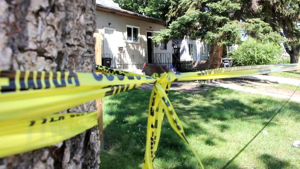 Police tape surrounds a home in the 100 block of Avenue K South on July 11, 2020. Dartagnan Whitehead, 18, was shot and killed at the home around midnight. Three people are now facing charges of second-degree murder in connection with the death. 