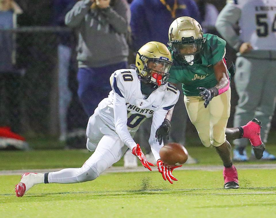 Hoban's Tylan Boykin nearly intercepts a fourth-quarter pass intended for St. Vincent-St. Mary's Torell Hopson III on Oct. 7, 2022, in Akron.