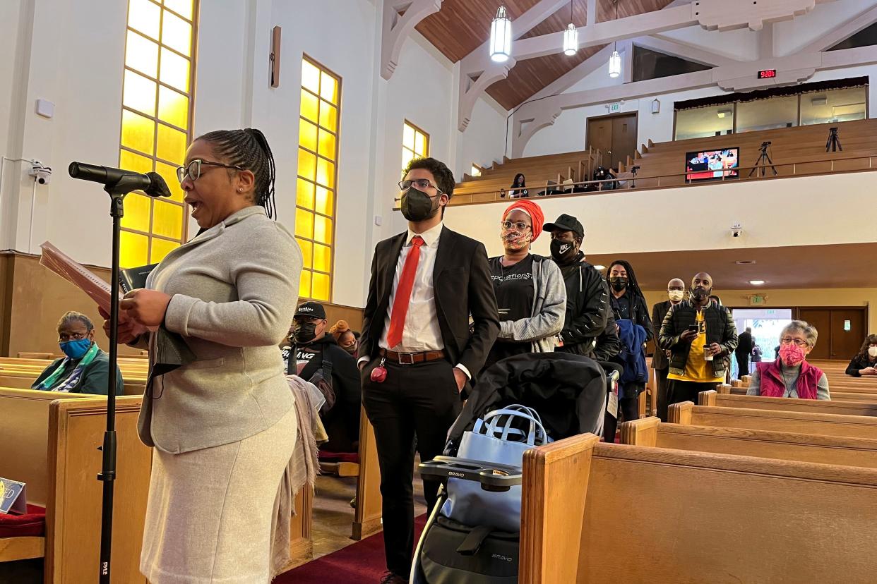 People line up to speak during a reparations task force meeting at Third Baptist Church in San Francisco on April 13, 2022,