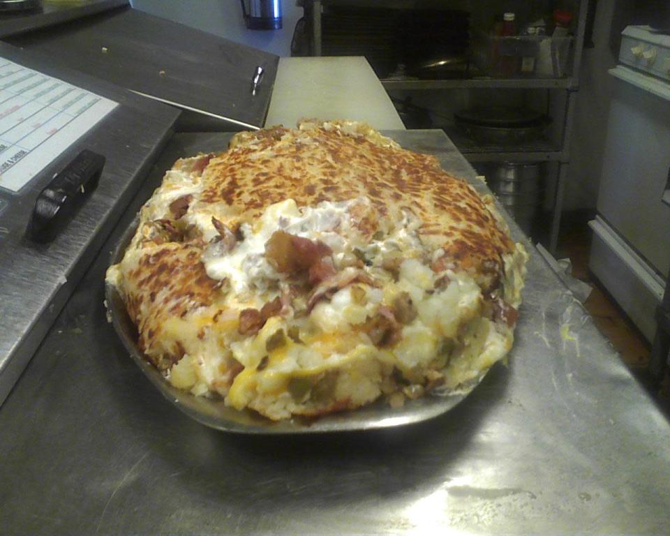 <b>Michigan: 10 Pound Hashbrown</b> You can take a stab at this 10-pound hash brown at Papa Bears in Muskegon, Michigan.<br> <br> (Image courtesy Papa Bears)