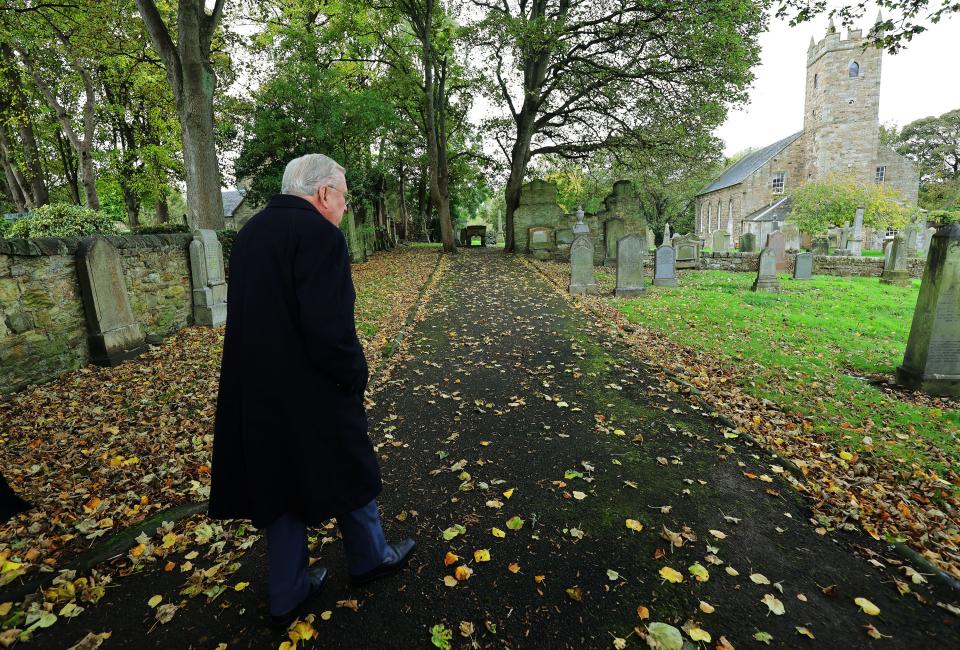 President M. Russell Ballard of The Church of Jesus Christ of Latter-day Saints walks to the Tranent Parish Church in Tranent, Scotland.