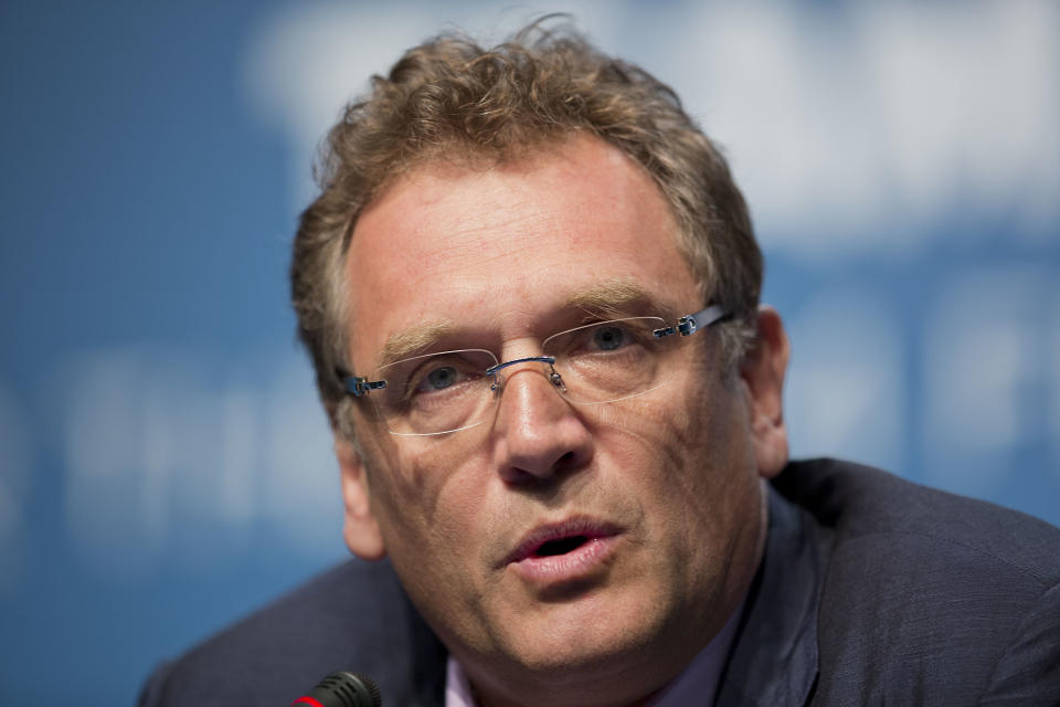 FILE - In this Feb. 18, 2014 file photo, Former FIFA Secretary General Jerome Valcke speaks during a news conference for the 2014 World Cup in Florianopolis, Brazil. Qatari soccer and television executive Nasser al-Khelaifi will go on trial starting Sept. 14, 2020 in Switzerland in September, implicated in providing a holiday villa to a FIFA official linked to a World Cup broadcasting deal. The court has listed 10 days in September to hear the case against al-Khelaifi, former top FIFA official Jerome Valcke and another broadcasting executive who was not identified. (AP Photo/Andre Penner, file)