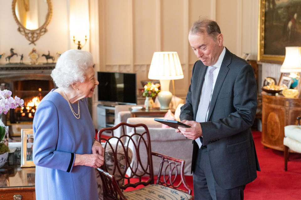 Queen Elizabeth II presents Thomas Trotter with the Queen's Medal for Music at an audience at Windsor Castle. Picture date: Wednesday December 8, 2021.