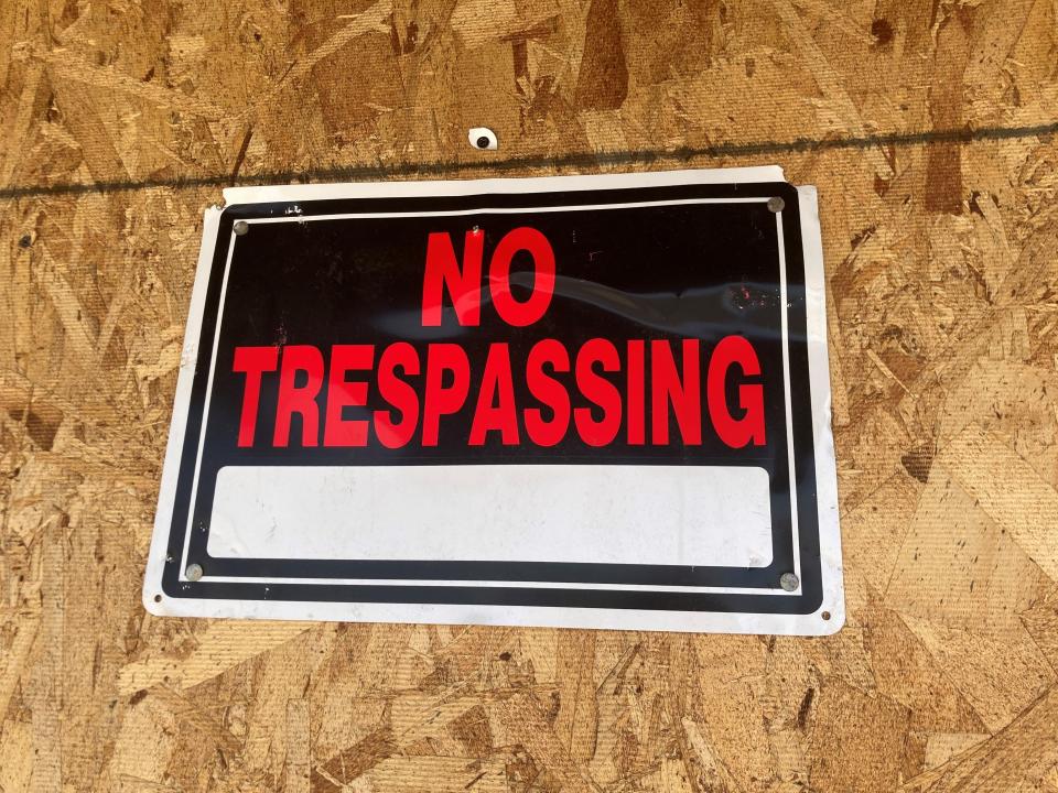 A 'no trespassing' sign is displayed outside the Albany Building at 125 E. Seventh St. on June 15, 2023, in Pueblo, Colo.