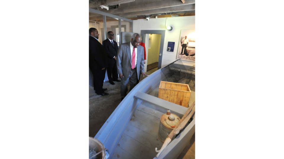 Supreme Court Justice Clarence Thomas looks at the displays inside the Pin Point Heritage Museum. Thomas was born in Pin Point, a small, predominantly Black community near Savannah, Georgia. - Richard Burkhard/The Savannah Morning News/USA Today Network