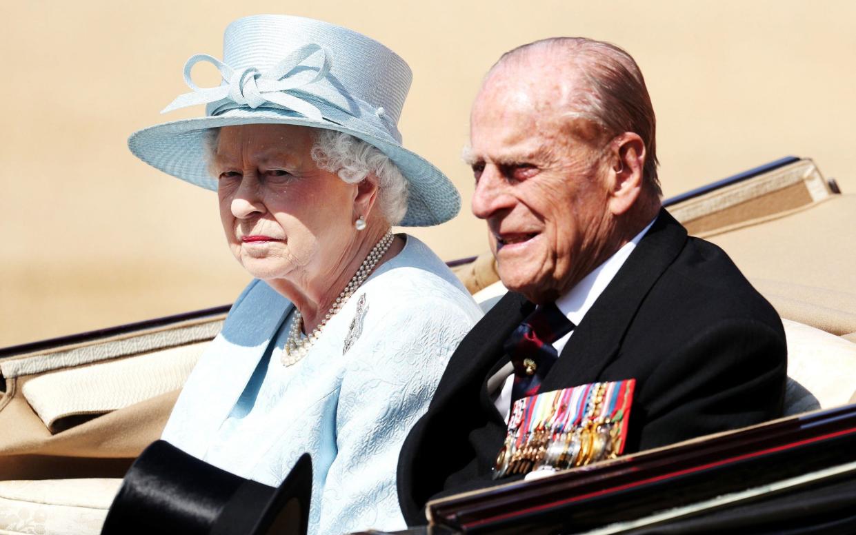 The Queen and Prince Philip in 2017. The puppy was a "distraction" for Her Majesty while she was grieving, a royal expert said - PA