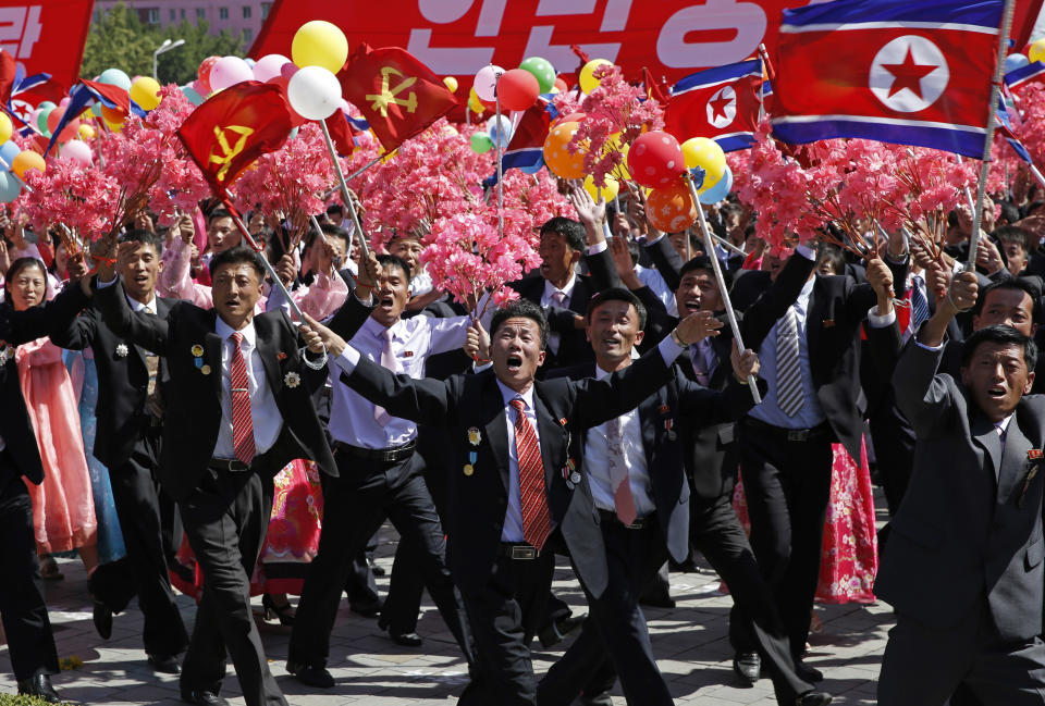 Participants march during a parade for the 70th anniversary of North Korea's founding day in Pyongyang, North Korea, Sunday, Sept. 9, 2018. North Korea staged a major military parade, huge rallies and will revive its iconic mass games on Sunday to mark its 70th anniversary as a nation. (AP Photo/Kin Cheung)