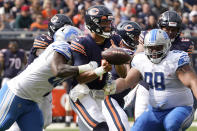 Detroit Lions linebacker Charles Harris strips Chicago Bears quarterback Justin Fields of the ball during the second half of an NFL football game Sunday, Oct. 3, 2021, in Chicago. The Bears won 24-14. (AP Photo/David Banks)