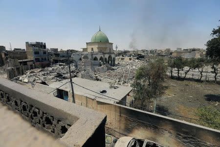 The ruined Grand al-Nuri Mosque is seen after it was retaken by the Iraqi forces from the Islamic State militants at the Old City in Mosul, Iraq, June 30, 2017. REUTERS/Alaa Al-Marjani
