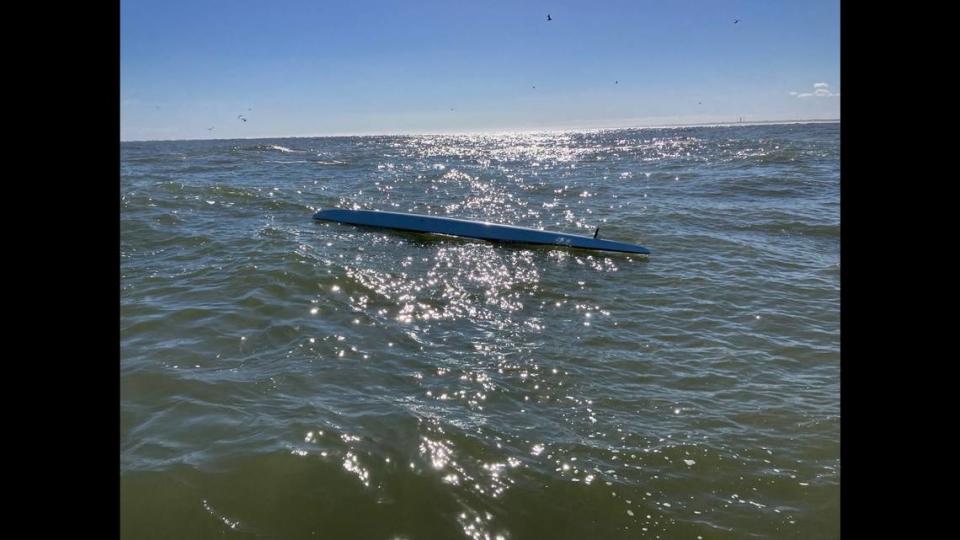 Eiffel Gilyana’s kayak is seen floating upside down after he went missing.