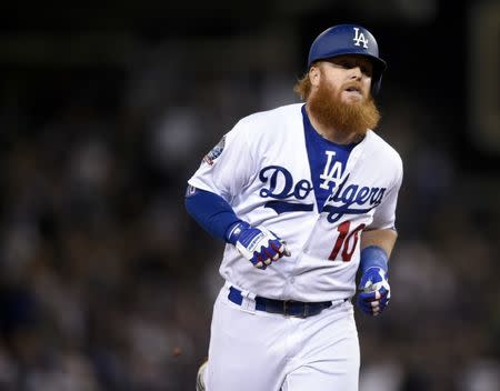 Aug 31, 2018; Los Angeles, CA, USA; Los Angeles Dodgers third baseman Justin Turner (10) rounds the bases after hitting the go-ahead solo home run during the eighth inning against the Arizona Diamondbacks at Dodger Stadium. Mandatory Credit: Kelvin Kuo-USA TODAY Sports