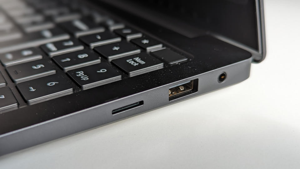 Close up detail shot of a Samsung Galaxy Book3 Ultra USB port and Micro Sd slot