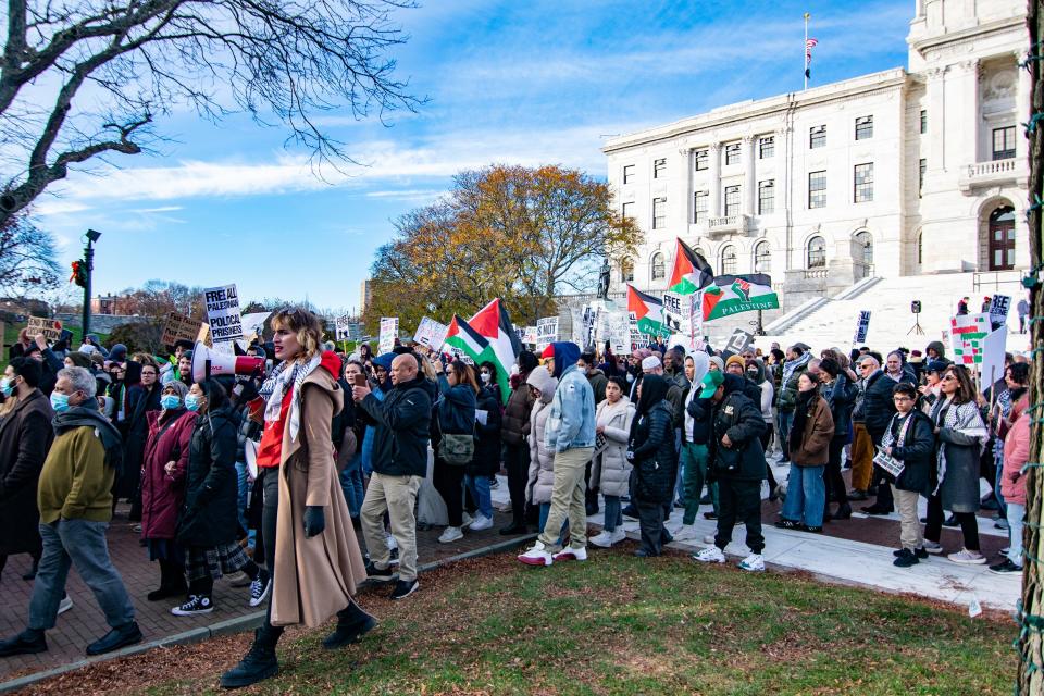 Pro-Palestine protesters march from the statehouse to Providence Place on Black Friday, 2023.