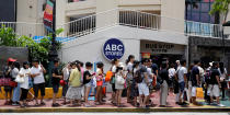 <p>Tourists wait for a bus in the Tumon tourist district on the island of Guam, a U.S. Pacific Territory, August 10, 2017. (Erik De Castro/Reuters) </p>