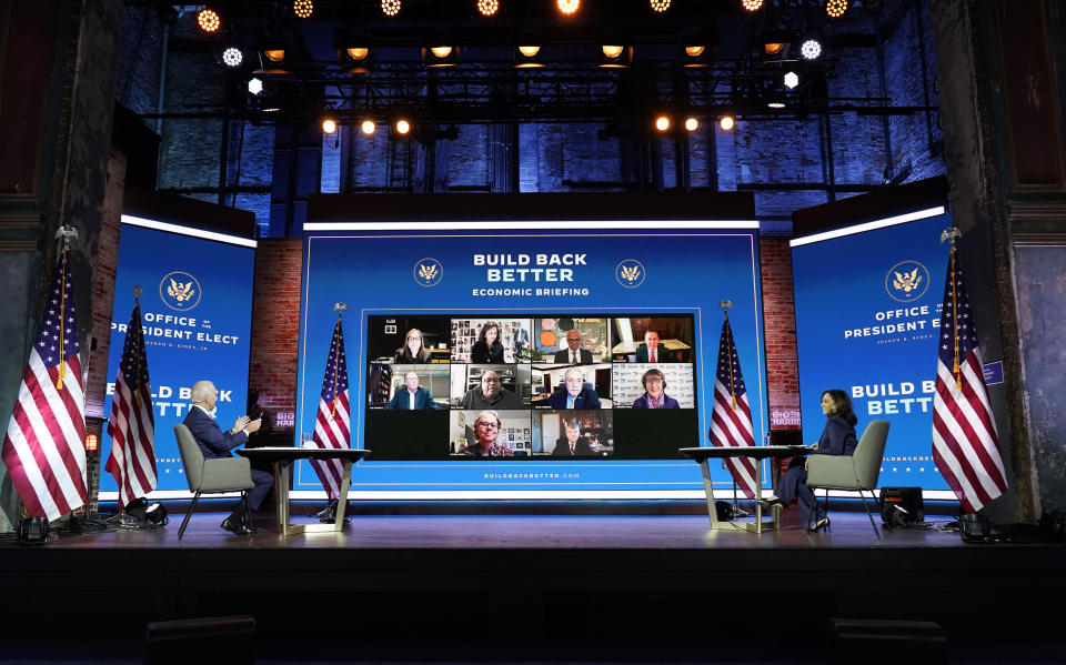 President-elect Joe Biden and Vice President-elect Kamala Harris attend a briefing on the economy at The Queen theater, Monday, Nov. 16, 2020, in Wilmington, Del. (AP Photo/Andrew Harnik)