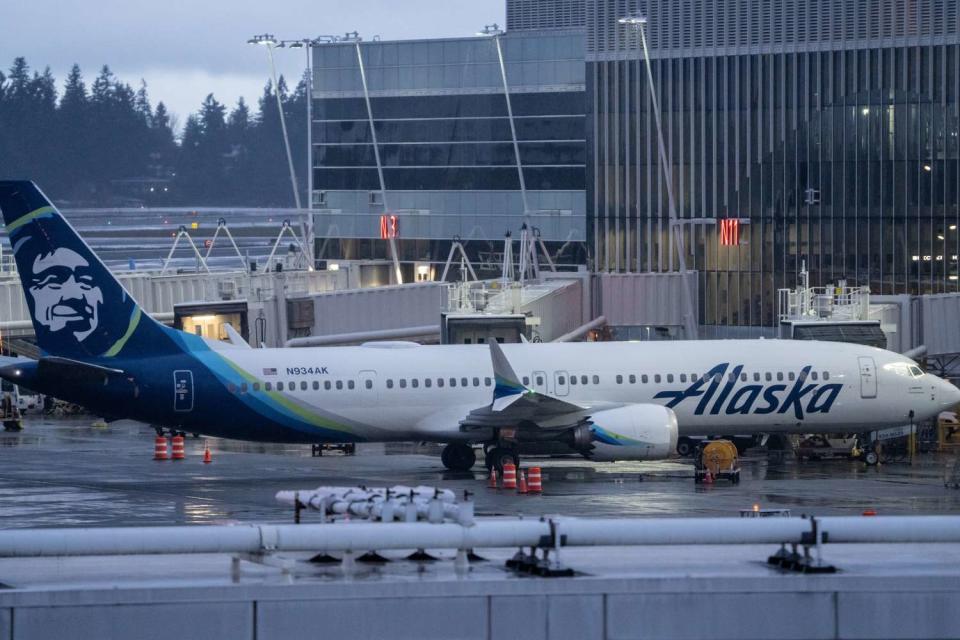 <p>Stephen Brashear/Getty</p> An Alaska Airlines Boeing 737 Max 9 plane