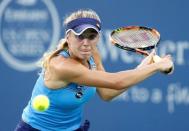 Aug 22, 2015; Cincinnati, OH, USA; Elina Svitolina (UKR) returns a shot against Serena Williams (not pictured) in the semifinals during the Western and Southern Open tennis tournament at the Linder Family Tennis Center. Mandatory Credit: Aaron Doster-USA TODAY Sports