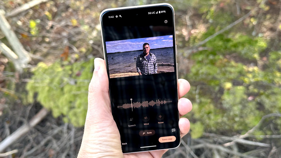 Google Pixel 8 shown held in hand