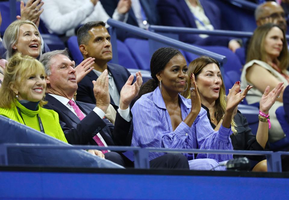 Michelle Obama sits courtside at the US Open.