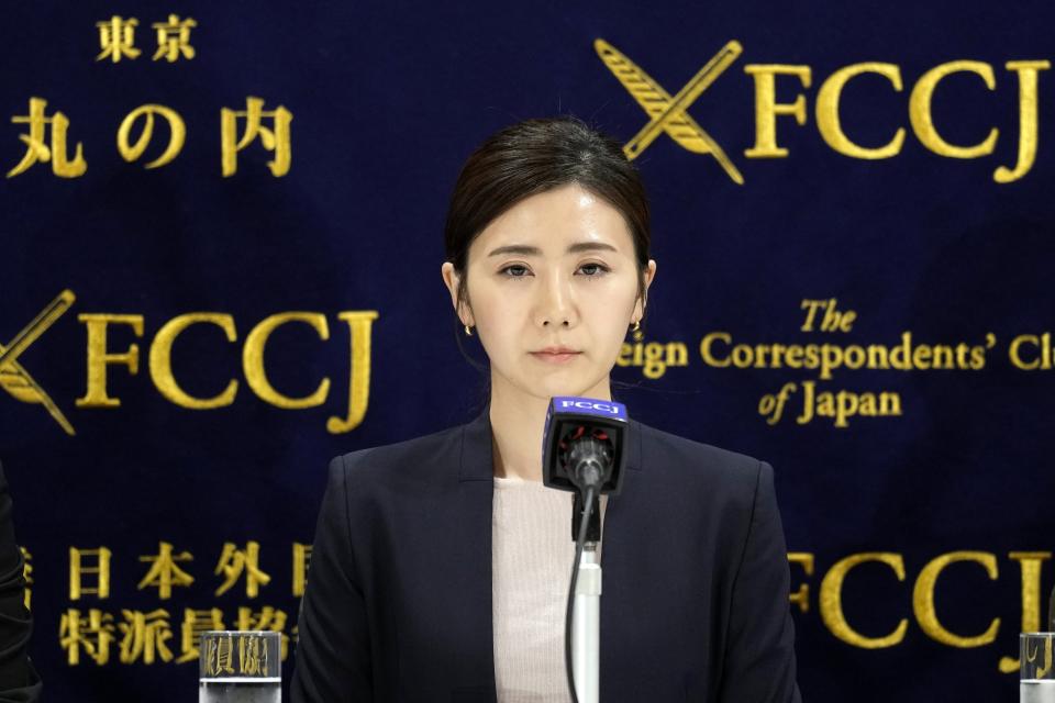 Former Japanese table tennis player and Olympic medallist Ai Fukuhara prepares to make a brief statement during a news conference about a child-custody agreement she forged with ex-husband Chiang Hung-chieh of Taiwan at the Foreign Correspondents' Club of Japan (FCCJ) Friday, March 15, 2024, in Tokyo. (AP Photo/Eugene Hoshiko)