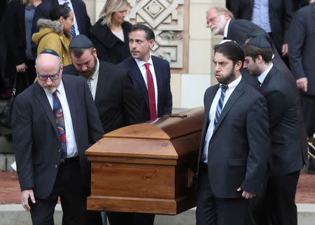 A casket is carried from Rodef Shalom Temple after funeral services for brothers Cecil and David Rosenthal, victims of the Tree of Life Synagogue shooting, in Pittsburgh, Pennsylvania, U.S., October 30, 2018. REUTERS/Cathal McNaughton