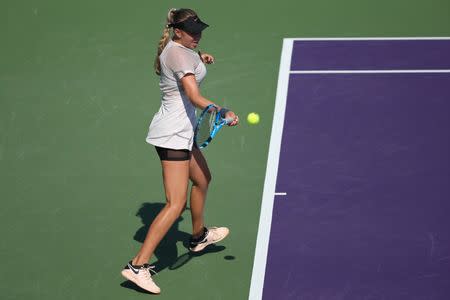 Mar 20, 2018; Key Biscayne, FL, USA; Amanda Anisimova of the United States hits a forehand against Qiang Wang of China (not pictured) on day one of the Miami Open at Tennis Center at Crandon Park. Anisimova won 6-3, 1-6, 6-2. Geoff Burke-USA TODAY Sports