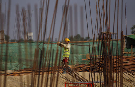 A man works at the site of the Thilawa Special Economic Zone (SEZ) project at Thilawa May 8, 2015. REUTERS/Soe Zeya Tun/File Photo