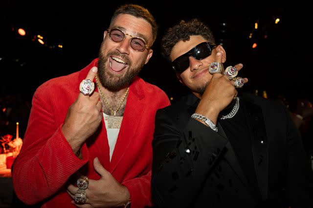 <p>Kansas City Chiefs</p> Travis Kelce shows off his bling with Patrick Mahomes