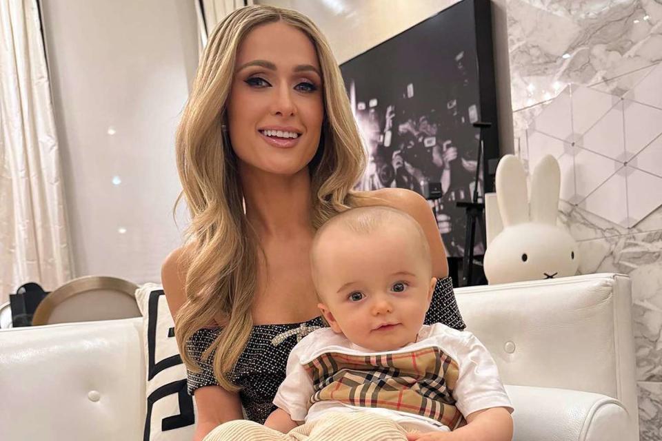 <p>Paris Hilton/Instagram</p> Paris Hilton smiles with baby Phoenix in New York City