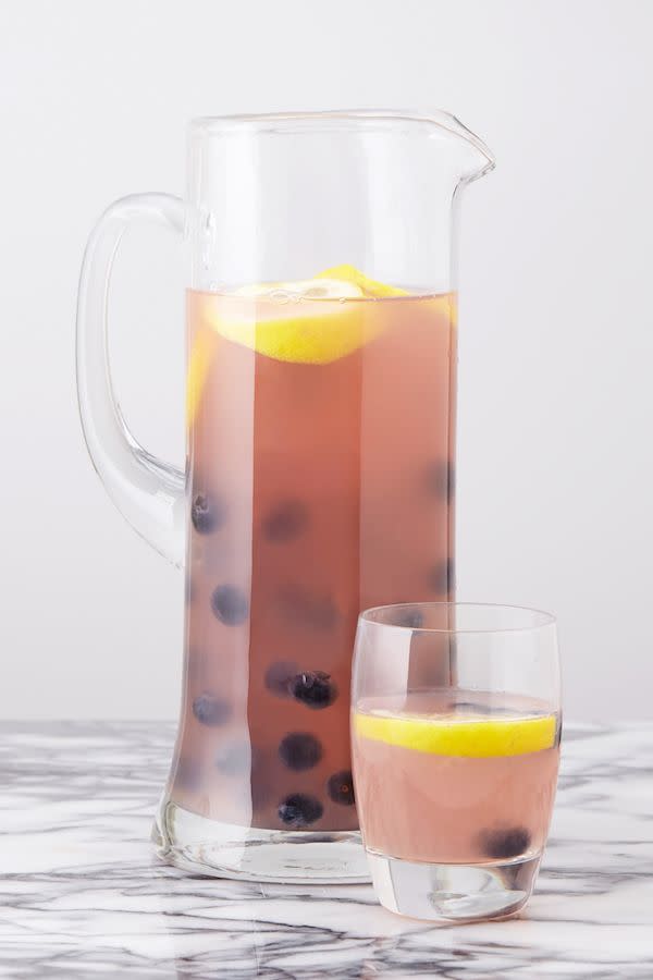 <p>It's next-level spiked lemonade.</p><p>Get the recipe from <a href="https://www.delish.com/cooking/recipes/a43033/best-blueberry-sangria-recipe/" rel="nofollow noopener" target="_blank" data-ylk="slk:Delish;elm:context_link;itc:0;sec:content-canvas" class="link ">Delish</a>.</p>