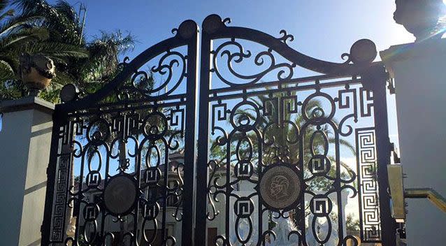 The gates to the famous mansion on the Gold Coast. Source: Facebook.