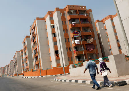 Egyptians walk at the housing project "Long Live Egypt" at Al-Asmarat, a housing complex in Al Mokattam area, at Cairo's desert outskirts, Egypt September 12, 2018. REUTERS/Amr Abdallah Dalsh