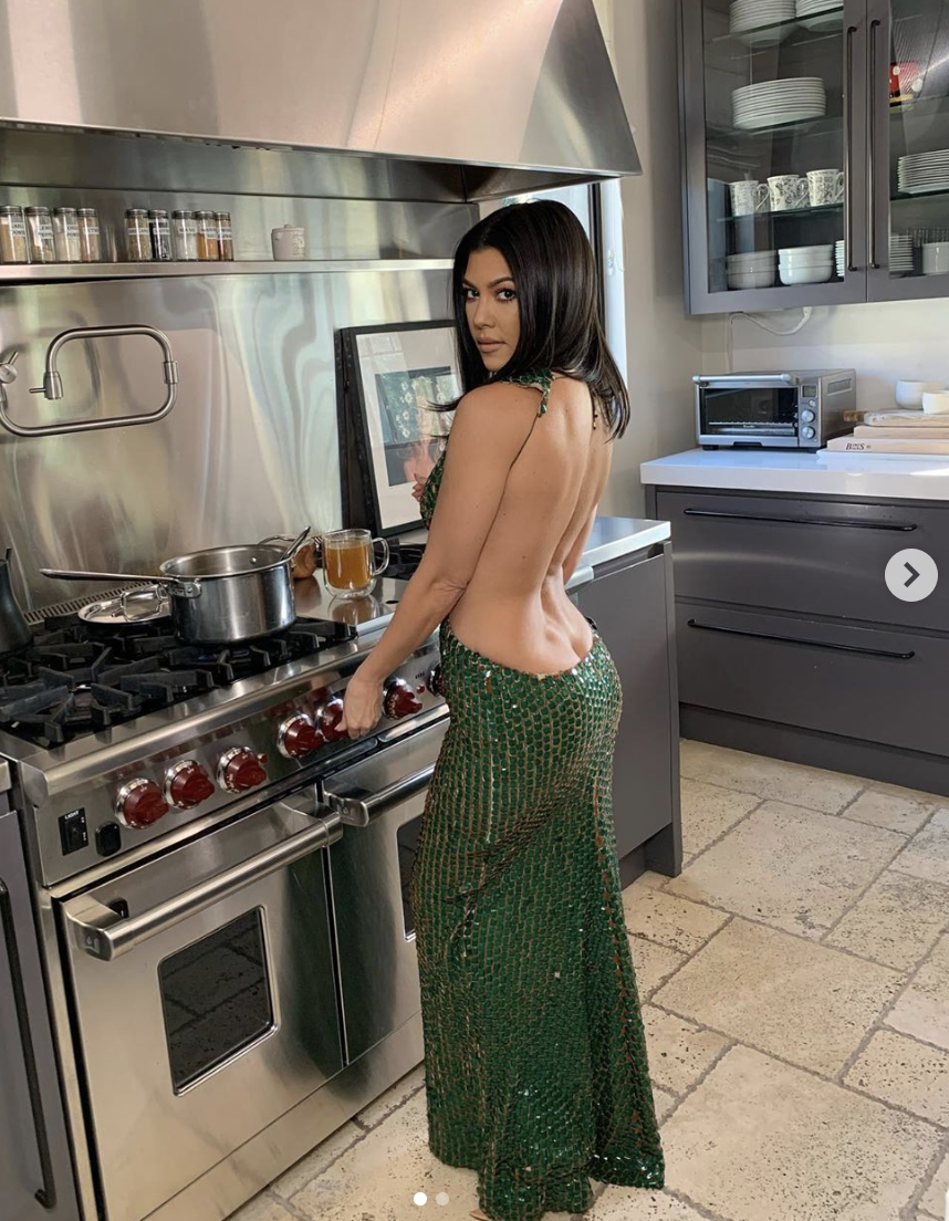 One detail in Kourtney Kardashian's revealing gown is sending fans into a tailspin. Photo: Instagram/kourtneykardash