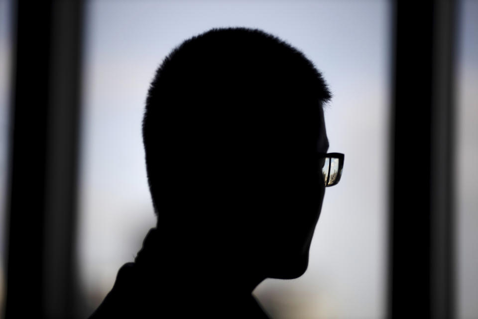 Tony Chen, a former OxyContin sales representative who spoke on condition that he only be identified by his English name, for fear of retribution, speaks during an interview in China on Sept. 19, 2019. The pressure to perform was intense. Chen and other reps said quarterly sales targets rose by as much as 30 percent. If he surpassed them, he could more than double his take home pay. If he didn't, he could lose his job. (AP Photo/Ng Han Guan)