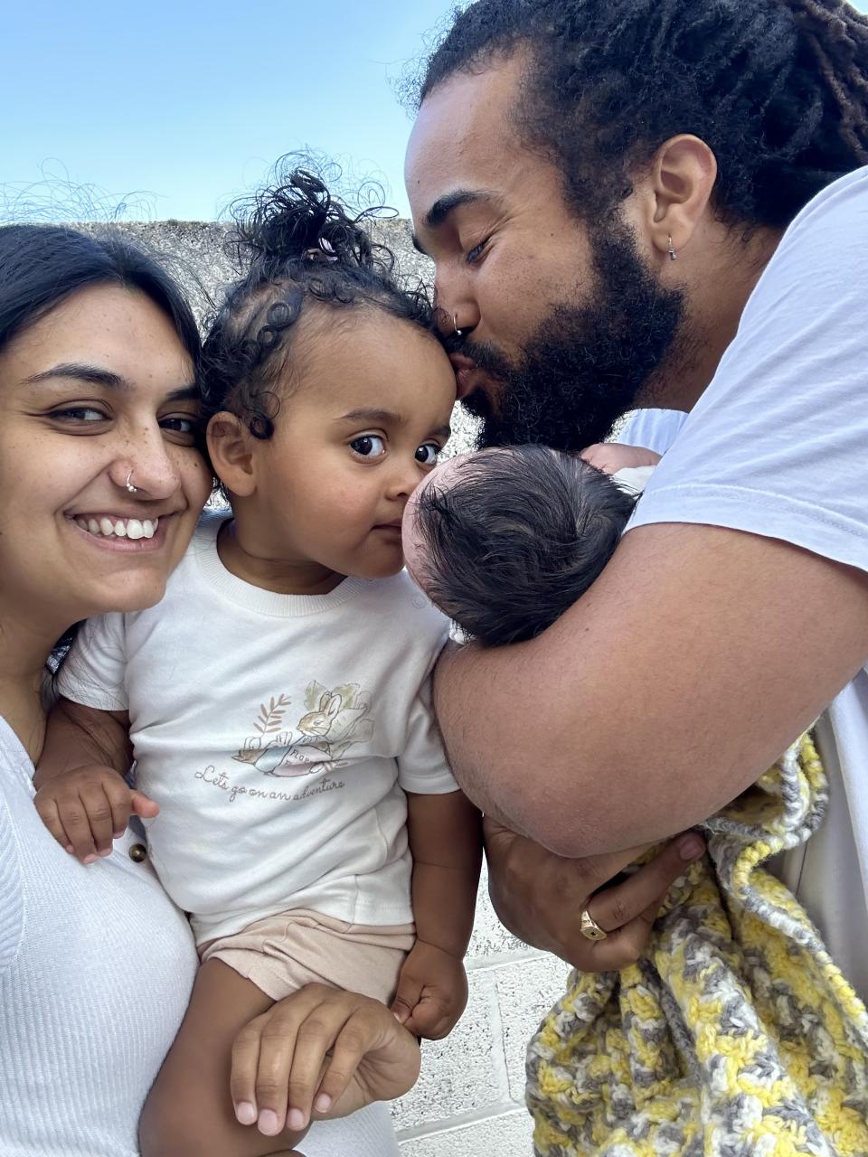 Tiah, Kieran and Zaya pictured with newborn Kehlani, after the newborn's dramatic arrival. (Tiah Parsan/SWNS)