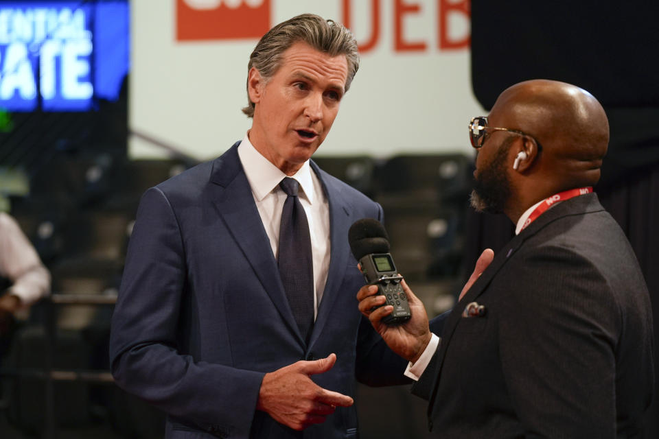 California Gov. Gavin Newsom speaks during an interview in the spin room before a presidential debate between President Joe Biden and Republican presidential candidate former President Donald Trump in Atlanta, Thursday, June 27, 2024. (AP Photo/John Bazemore)