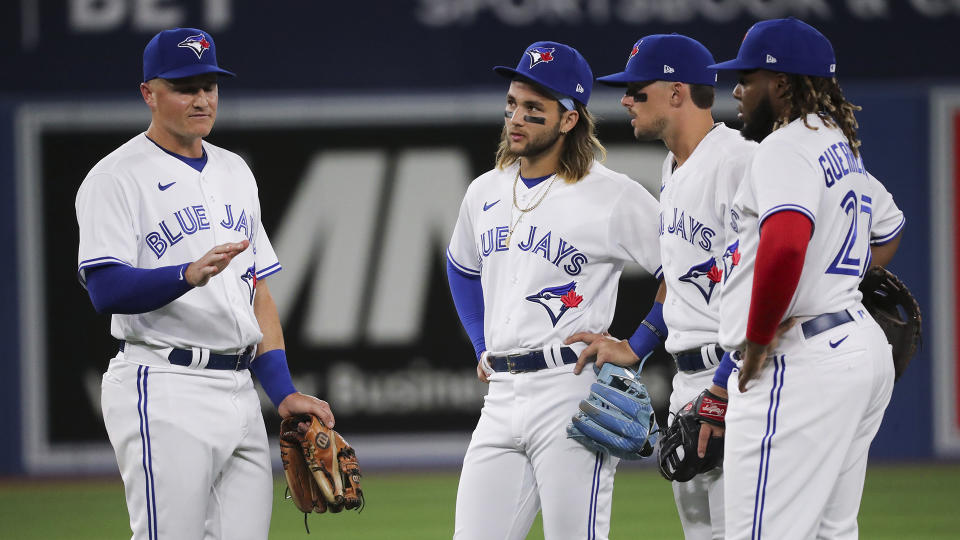 Matt Chapman, left, has plenty of wisdom for the young Blue Jays to soak up. (Richard Lautens/Toronto Star via Getty Images)